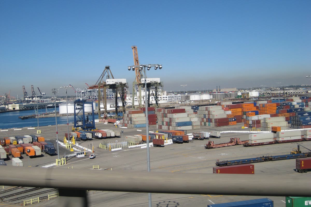 Container cranes and stacked boxes at the Port of Long Beach, California